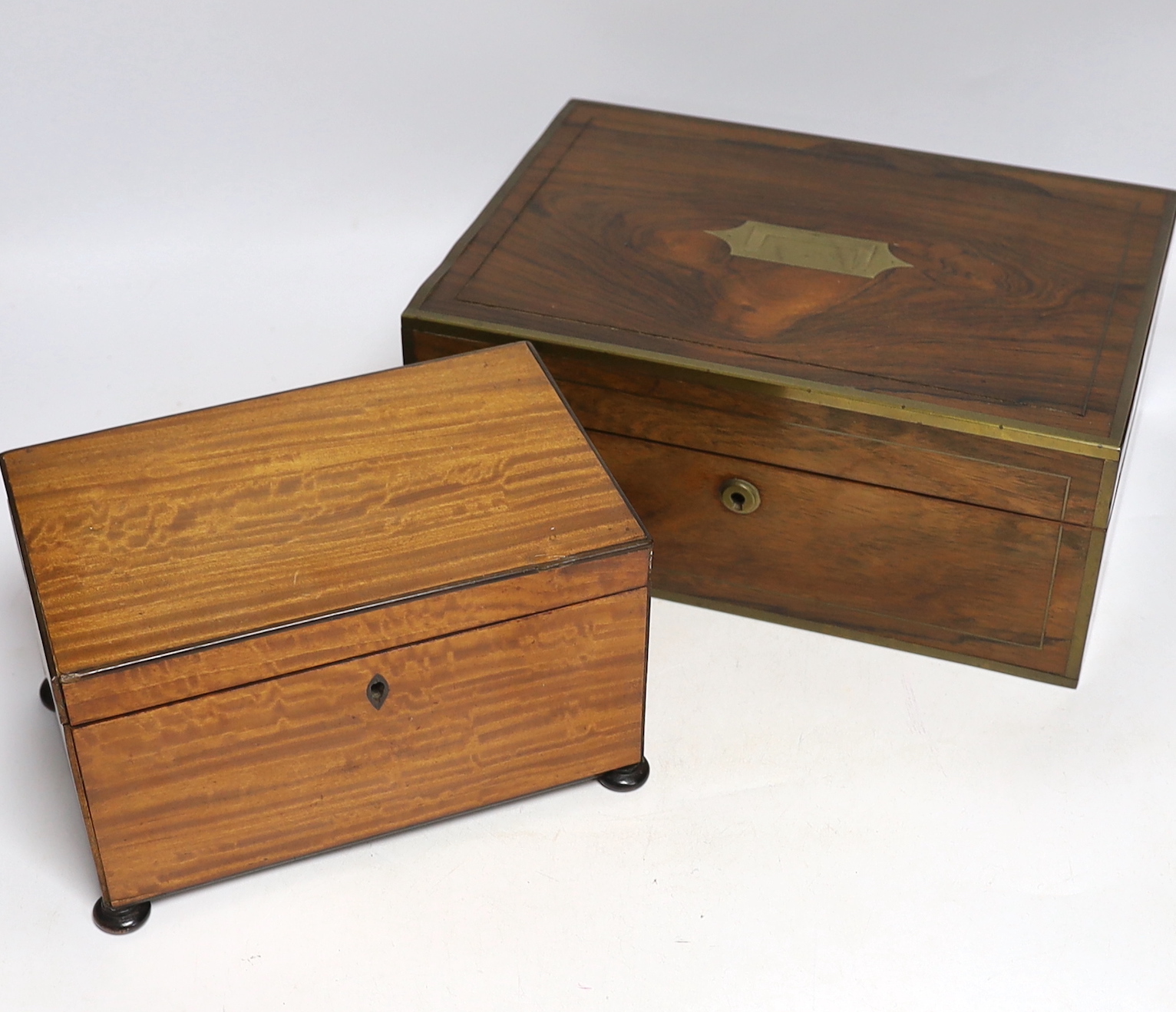 A Victorian brass bound rosewood writing box, 30.5 x 22 x 13cm, a George IV satinwood tea caddy and three Japonaise lacquered wall brackets